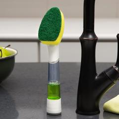 The Dishmatic® I-Stand Dish Wand is a soap dispensing standing dish wand that will look good on any kitchen countertop. The handle can be filled with your favorite dish soap, and allows you to apply it precisely where desired. A flow control mechanism allows you to select the amount of dish soap dispensed depending on the cleaning task at hand. It stands up so you can store within easy reach at all times. There are even a variety of optional, interchangeable heads, sold separately.