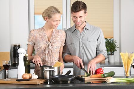 Man and Woman cooking food.